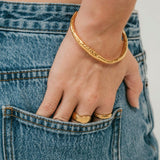 Olive James.  Bangle Holly Hammered Cuff