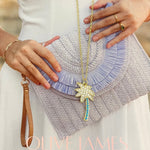 Olive James.  Palm Royale